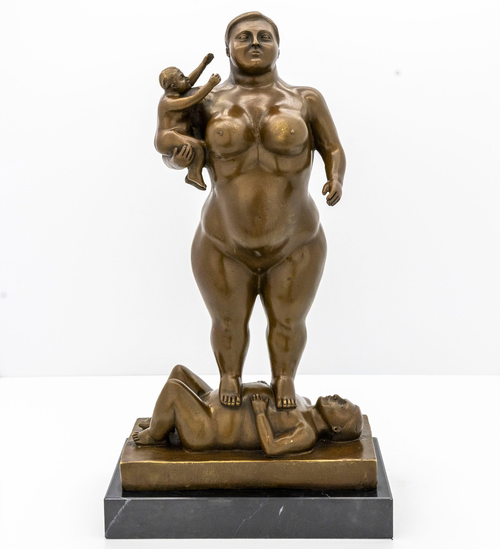 Sign Fernando Botero, Mother and Child Standing on Man, Cast Bronze: Artist / Title: Botero, Mother and Child Standing on Man Year / Period: Late 20th Century Medium: Bronze sculpture on black marble base Description: A finely cas