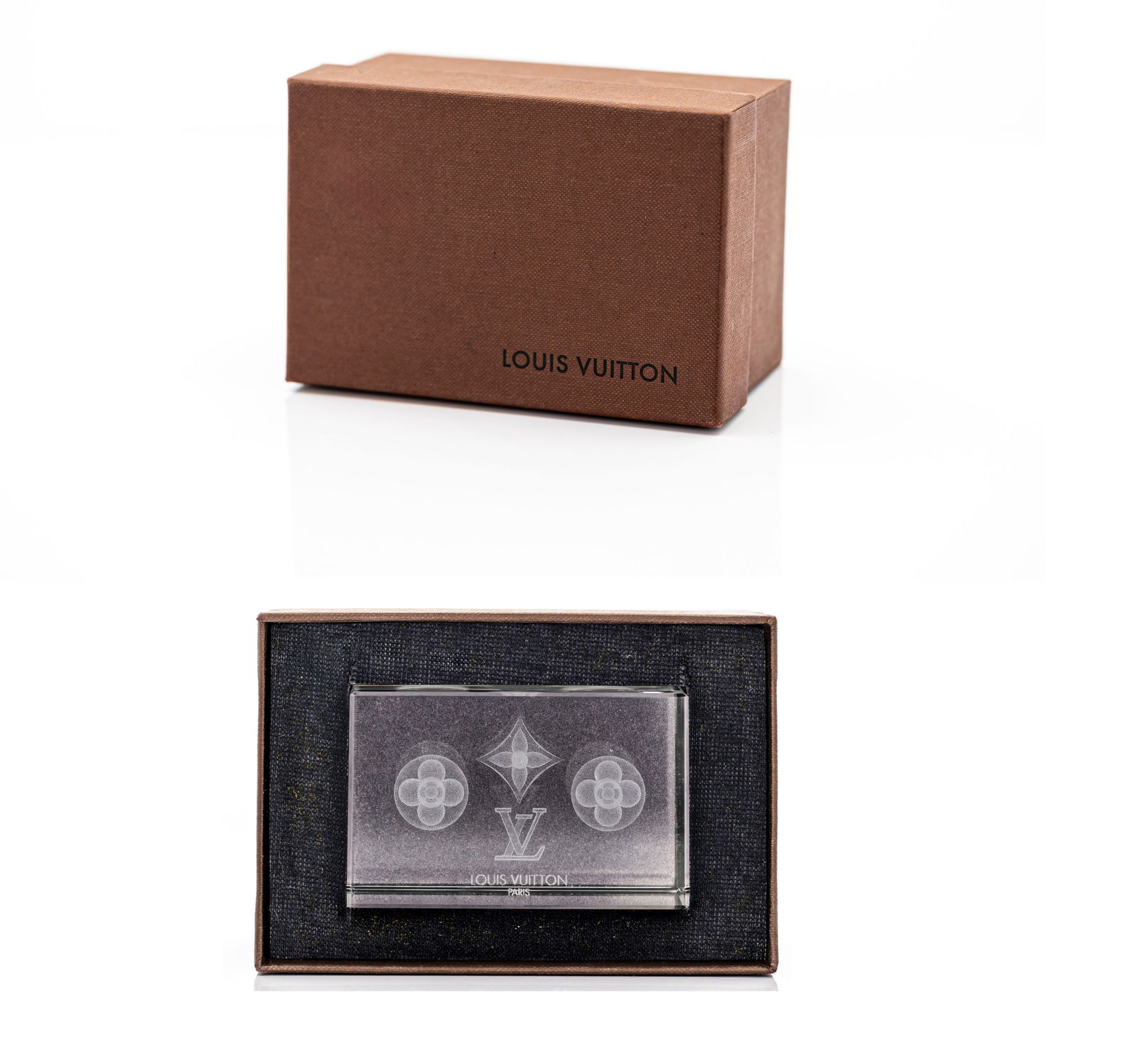 Louis Vuitton Monogram Crystal Paperweight: Brand: Louis Vuitton Model / Collection: Monogram Crystal Desk Paperweight Origin: France Period: Contemporary Material: Clear crystal gla