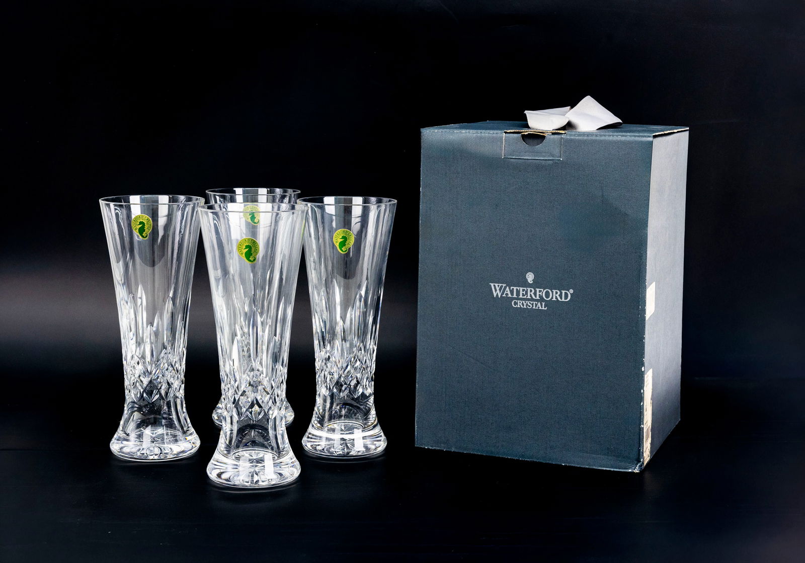 Waterford Crystal Lismore Pilsner Glasses Set of 4 with Original Box: Title: Waterfront Crystal Lismore Pilsner Glasses Set of 4, 142249 Type: Pilsner, Tall Beverage Glasses Capacity: approx. 13.5 oz, Height: approx. 8 3/8" Material:
