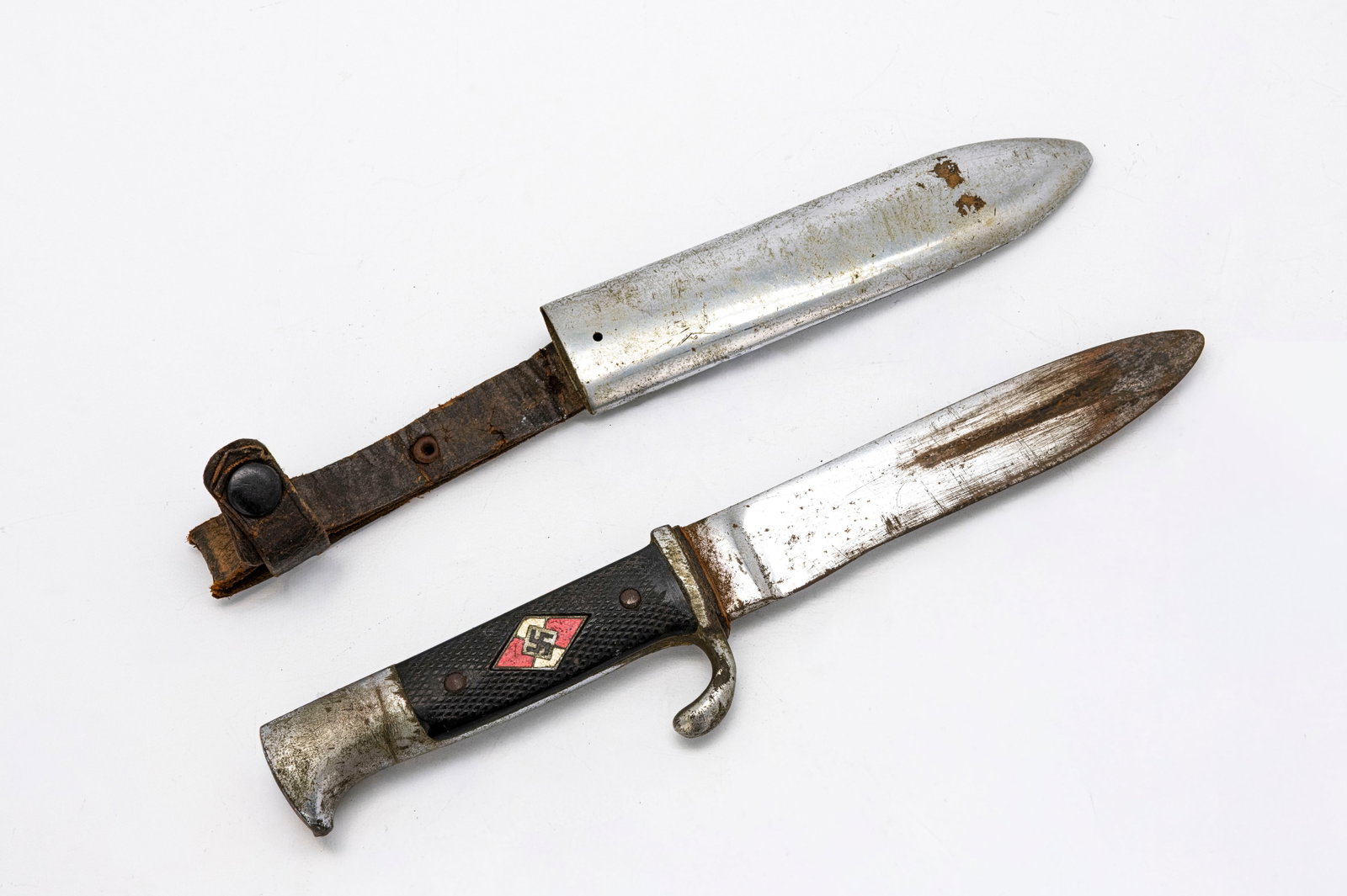 German WWII Hitler Youth Knife, RZM Marked, with Scabbard: Title: German WWII Hitler Youth Knife, RZM Marked, with Scabbard Origin, Year: Germany, WWII period (circa 1938–1945) Material: Steel blade, metal scabbard, composite grip with enamel