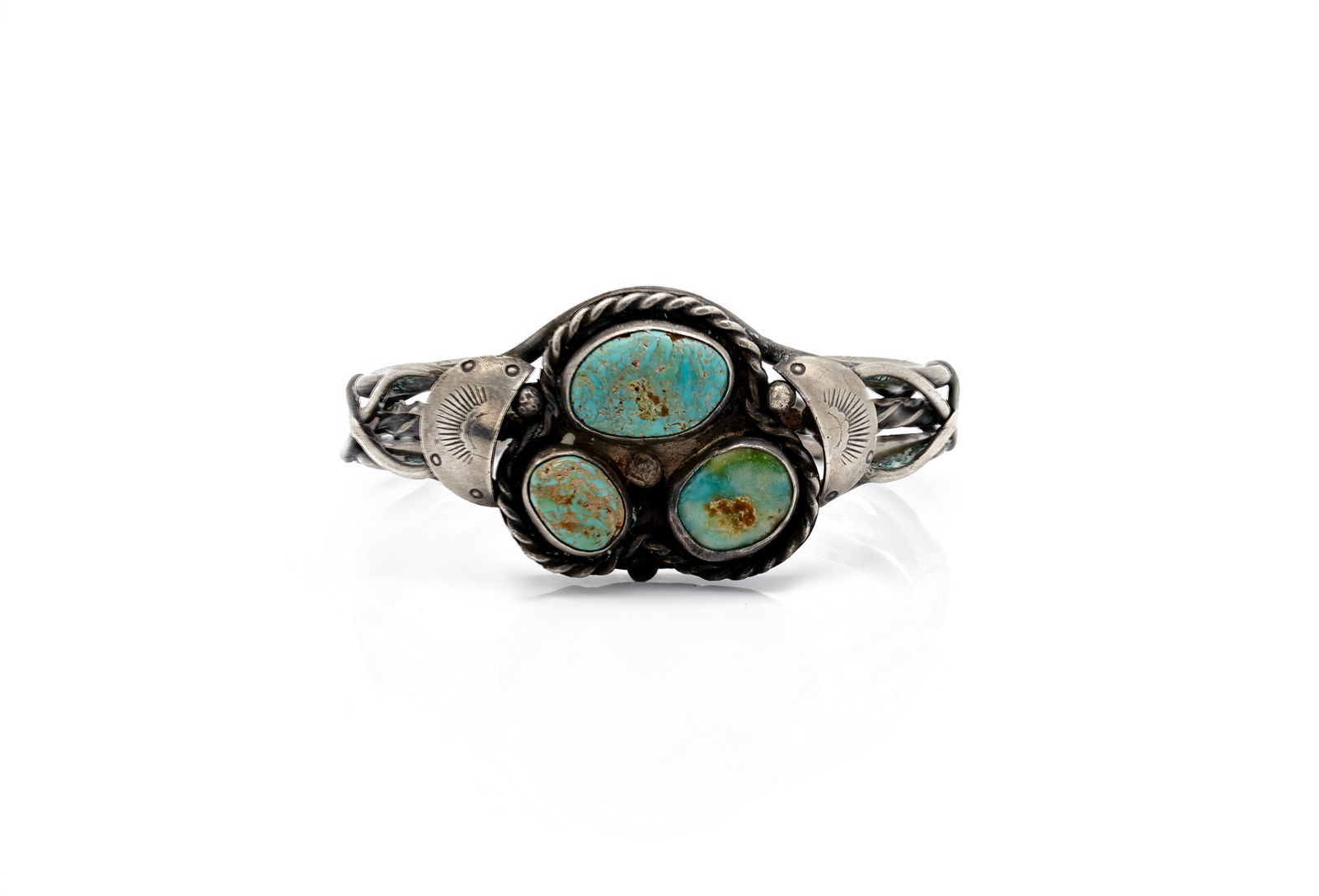 Navajo Three-Stone Turquoise Silver Cuff Bracelet: Title: Navajo Three-Stone Turquoise Silver Cuff BraceletOrigin: Native American, NavajoMaterial: Sterling silver with natural turquoise cabochonsSize: 6 3/4Weight: 49.17 gDescription: