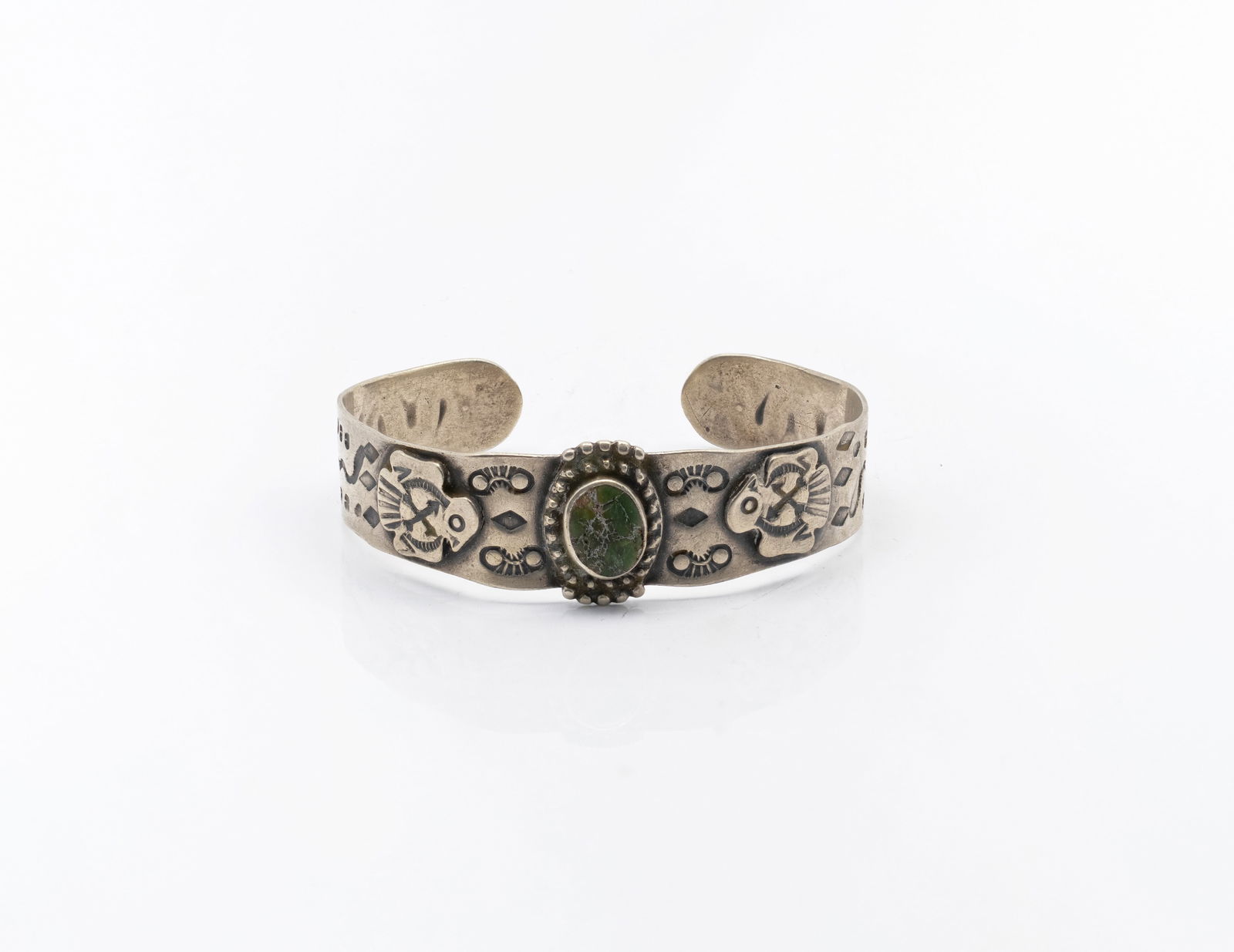 Navajo Silver Cuff Bracelet with Green Stone: Title: Navajo Silver Cuff Bracelet with Green Stone Origin: Native American, Navajo Material: Sterling silver with natural green stone cabochon Size: 6 1/2