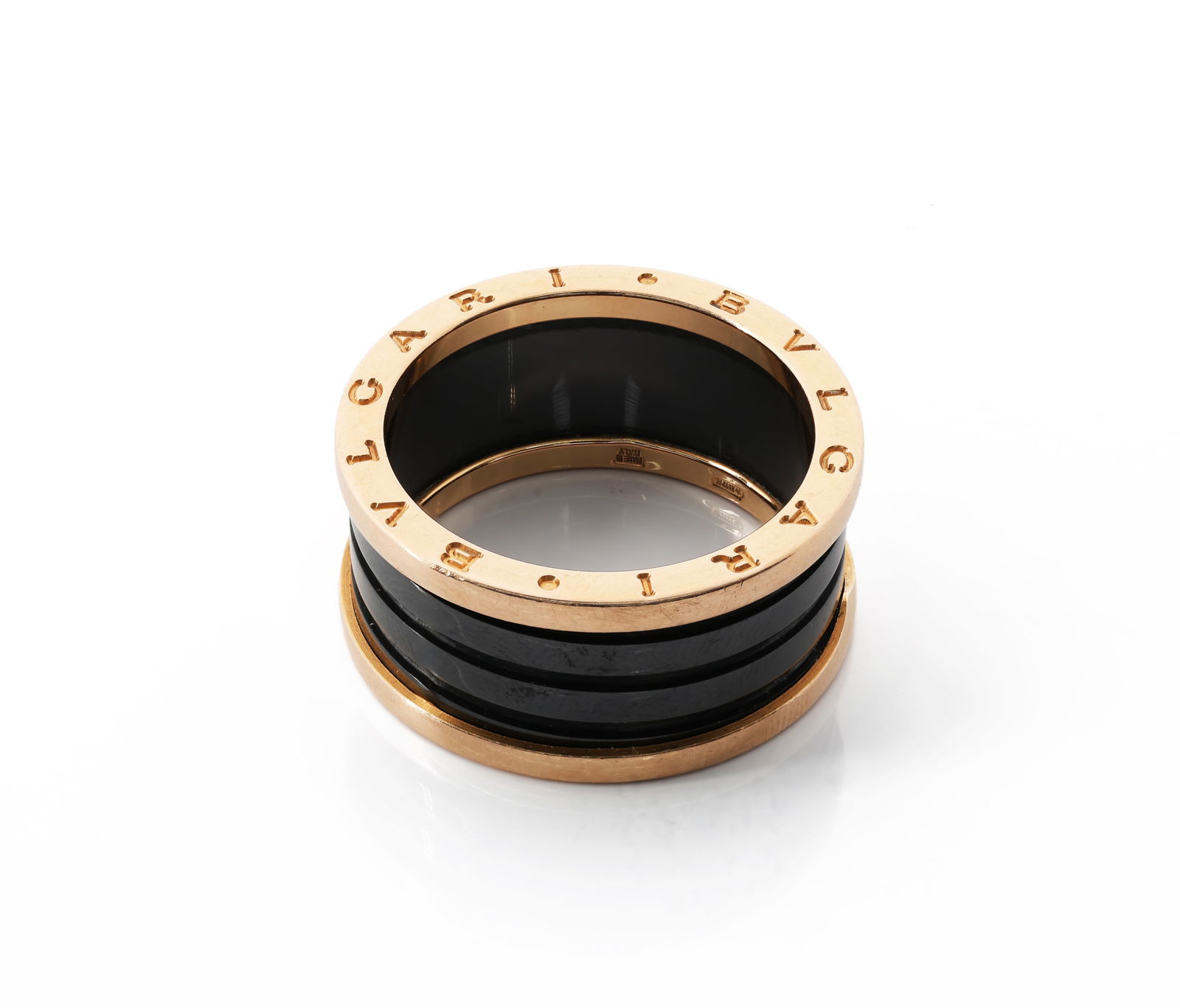 Bvlgari B. Zero1 Four Band Ring 18K Rose Gold Black Ceramic: Brand: Bvlgari B. Zero1 (introduced 1999) Material: 18K Rose Gold (AU 750) & Black Ceramic Hallmarks: "66 – AU 750" Serial Number: CXEYMM Size: