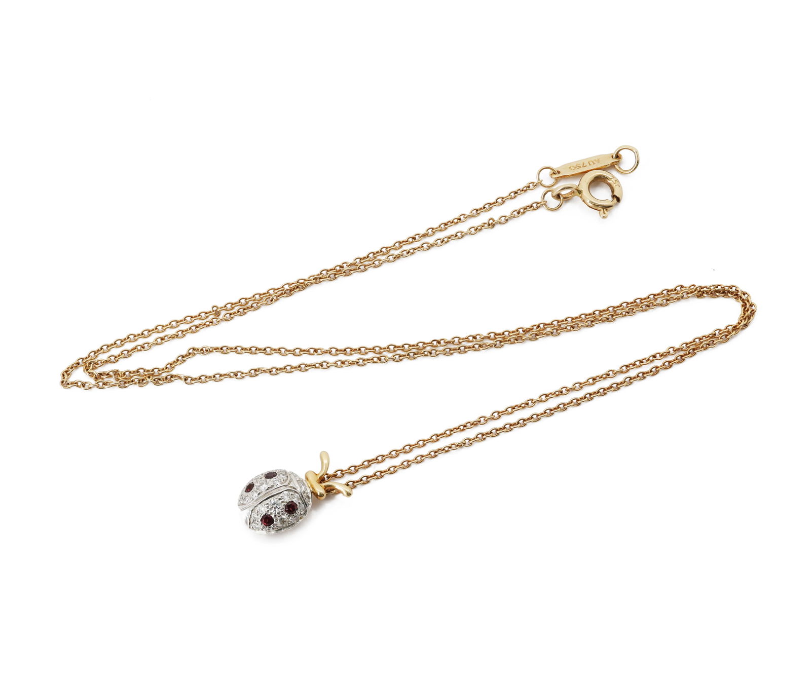 Tiffany & Co. Jean Schlumberger 18K Gold & Platinum Ladybug Pendant Necklace: Brand: Tiffany & Co. Jean Schlumberger 18K Gold & Platinum Ladybug Pendant Necklace Metal: 18K Yellow Gold (750), Platinum (PT950) Gemstones: Garnet and Diamonds 0.13 ct total