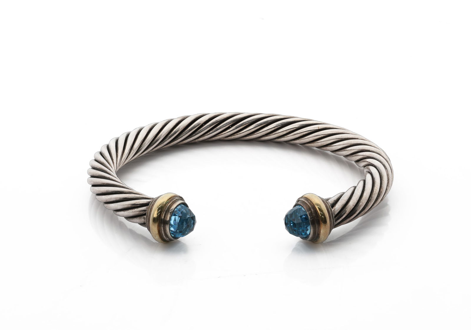 David Yurman, Classic Cable Bracelet Blue Topaz, Sterling Silver14K Gold, 7mm: Title: David Yurman, Classic Cable Bracelet with Blue Topaz. Medium: Sterling Silver 925 with 14K Yellow Gold 585 and Blue Topaz. Dimensions: Size M (fits wrists up to 6.3 in.); Width