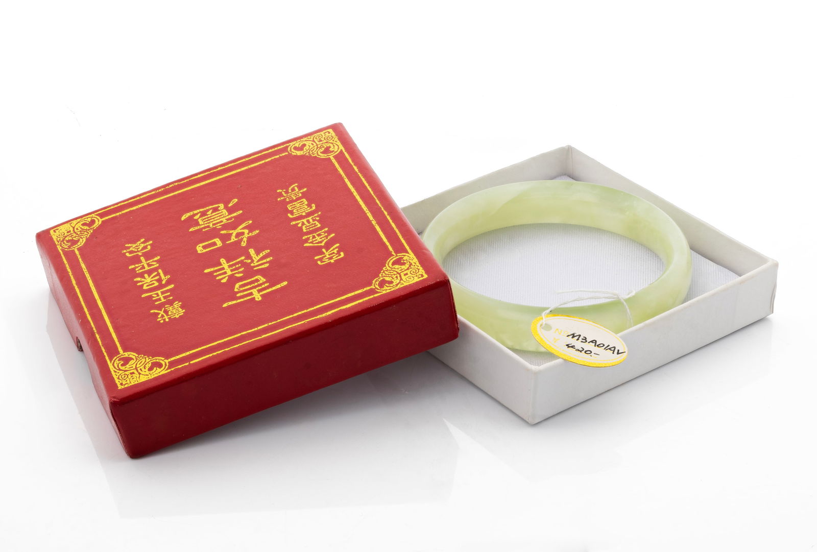 Chinese Green Jade Bangle Bracelet: Title: Chinese Green Jade Bangle Bracelet. Medium: Carved Jade Dimensions: width 0.5 in. Additional Information: Presented with fitted box; features soft translu