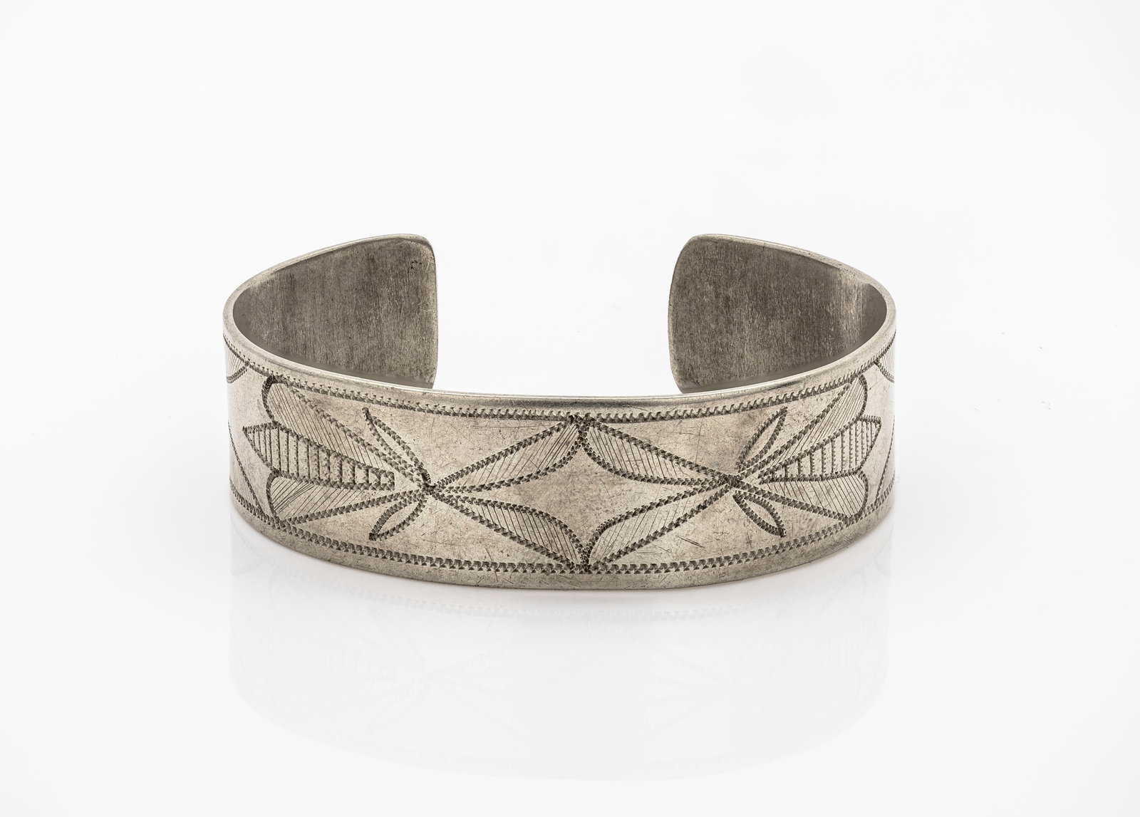 Set of 4 Navajo Native American Sterling Silver Rings & Bracelet: Title: Set of four Native American-style rings and one cuff bracelet, each with distinct designs and materials. Rings feature inlays of turquoise, coral, onyx, and mother of pearl, with detailed silve