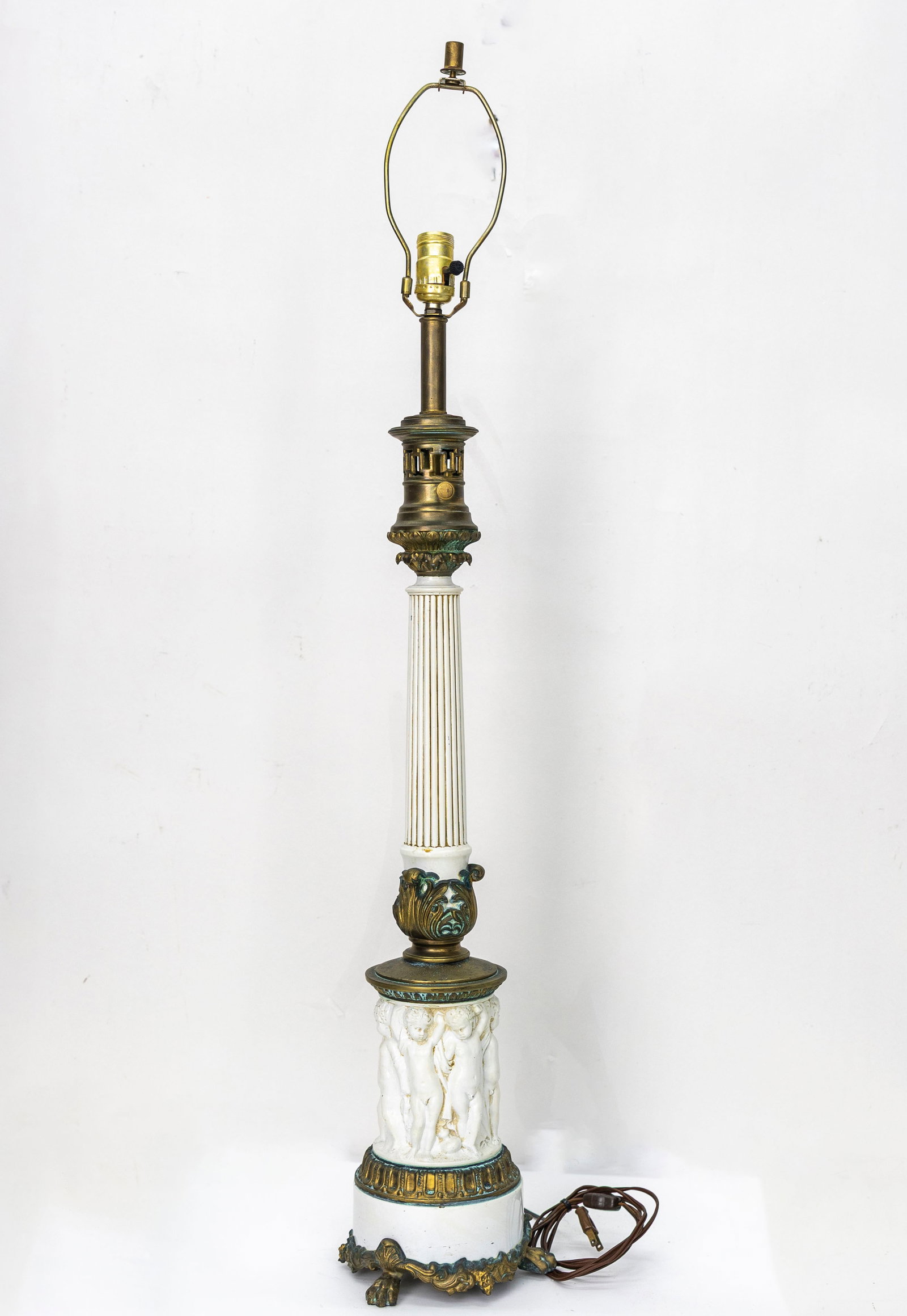 Antique Neoclassical Table Lamp: Title, Medium: Antique Neoclassical Table Lamp with Cherub Relief, Bronze & PorcelainOrigin, Year: Europe, early 20th century