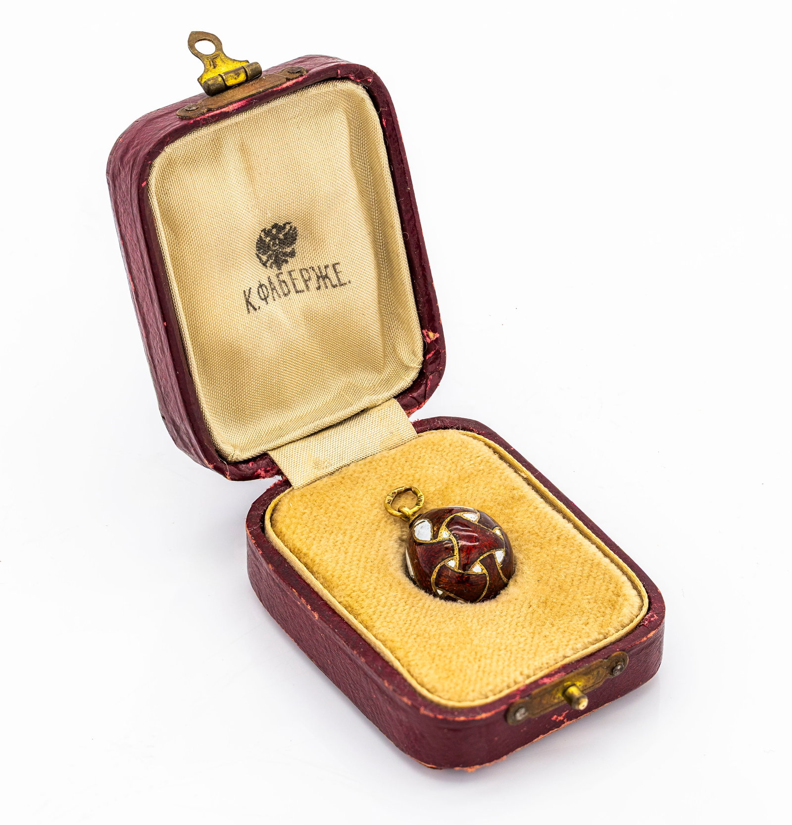 Russian 14K Gold Faberge Era Enamel Egg Pendant: Title: Russian 14K Gold and enamel Egg Pendant, Faberge Era Description: A finely crafted Rusian-style egg pendant made of 14K gold and decorate with rich red Guilloche enamel alternating with white e
