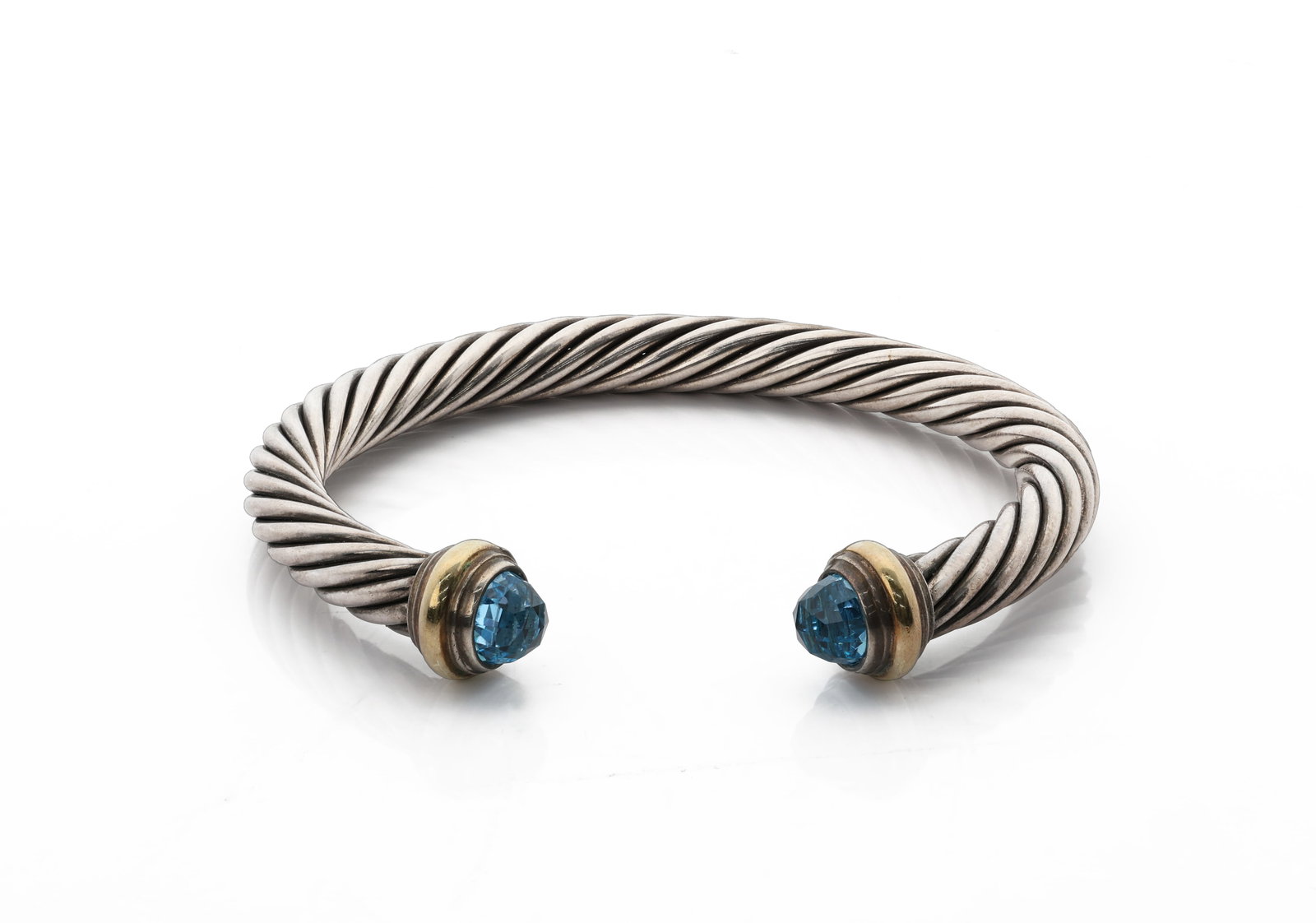 David Yurman, Classic Cable Bracelet Blue Topaz, Sterling Silver14K Gold, 7mm: Title: David Yurman, Classic Cable Bracelet with Blue Topaz. Medium: Sterling Silver 925 with 14K Yellow Gold 585 and Blue Topaz. Dimensions: Size M (fits wrists up to 6.3 in.); Width
