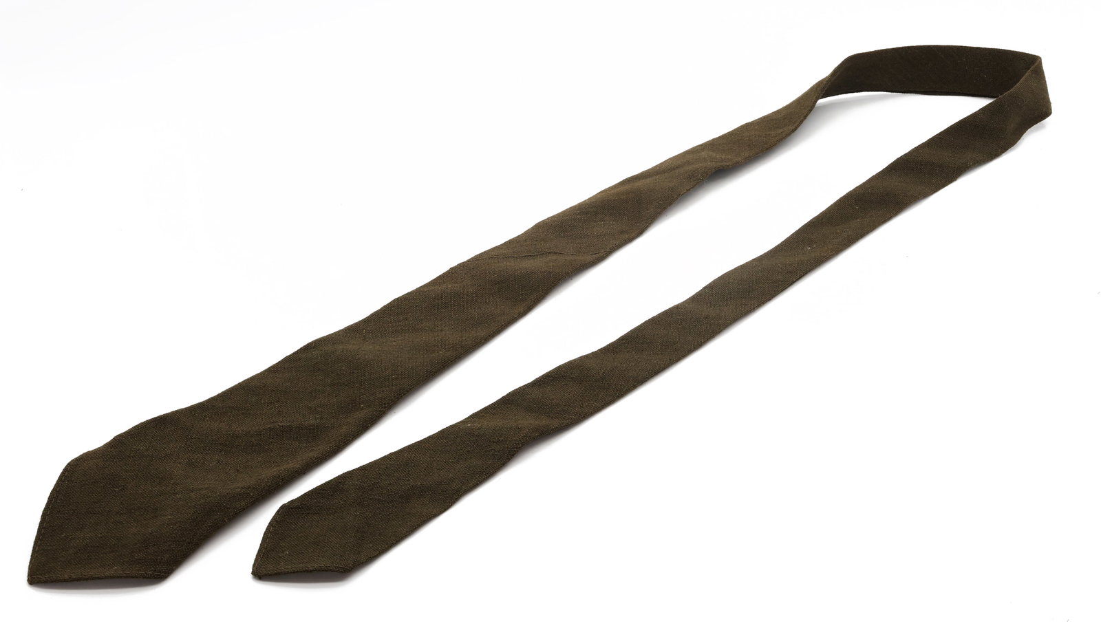 U.S. Military Olive Drab Uniform Tie: Title: U.S. Military Olive Drab Uniform Tie Origin: United States Year: Mid-20th Century Size: Standard necktie length. Marked: No visible