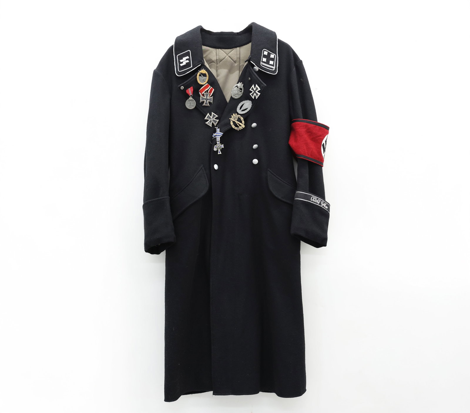 German WWII Allgemeine SS Officer's Overcoat with Decorations: Title: German WWII Allgemeine SS Officer's Overcoat with Decorations, circa 1939-1945 Origin: Germany Description: World War II-era German Allgemeine SS officer's overcoat constructed