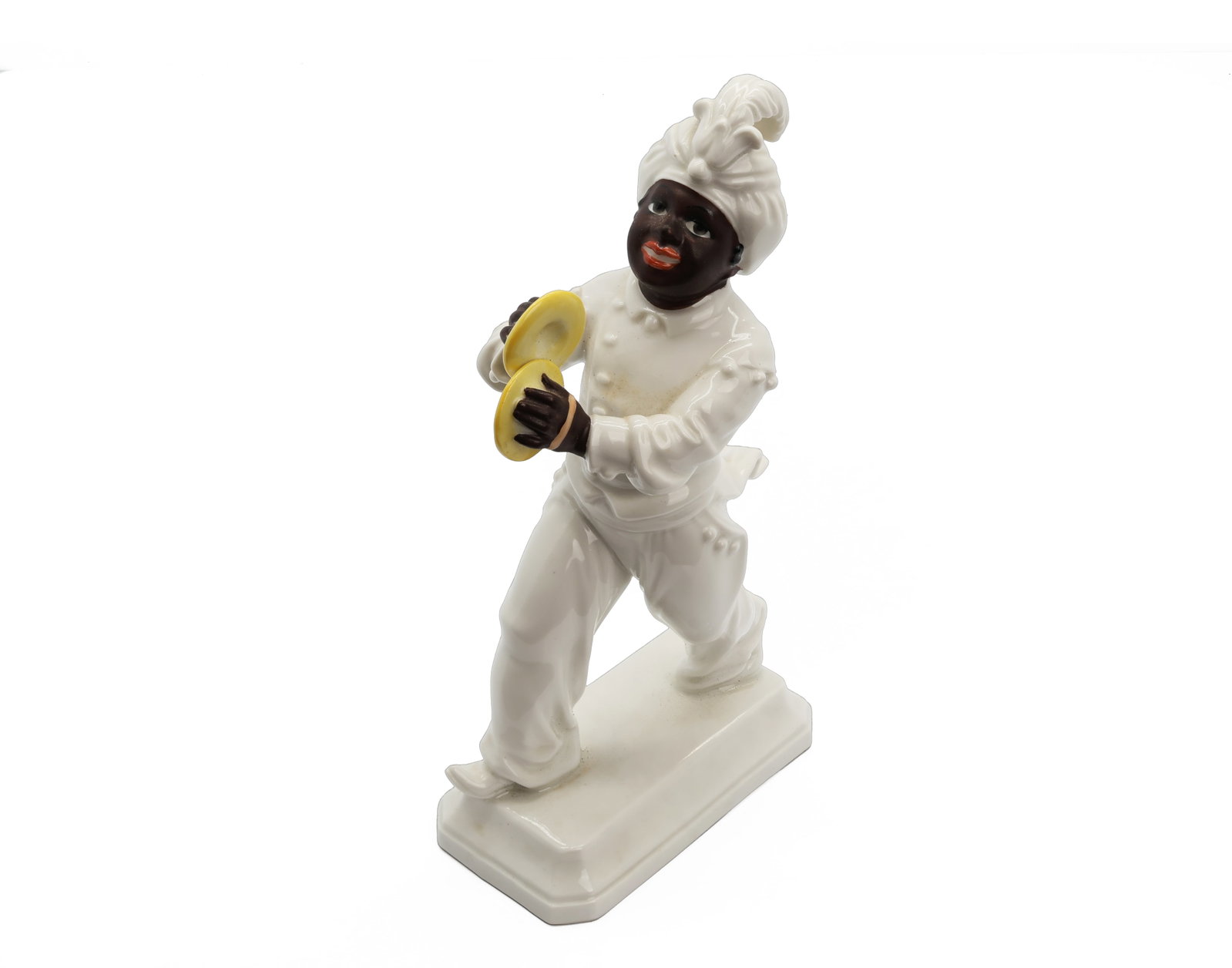 Rosenthal Sarotti-Mohr Porcelain Figure with Cymbals, Model No. 1055 by H. Meisel: Title: Rosenthal Sarotti-Mohr Porcelain Figure with Cymbals, Model No. 1055 by H. Meisel Origin: Germany Year: Early/Mid 20th Century Type: Porcelain Figurine
