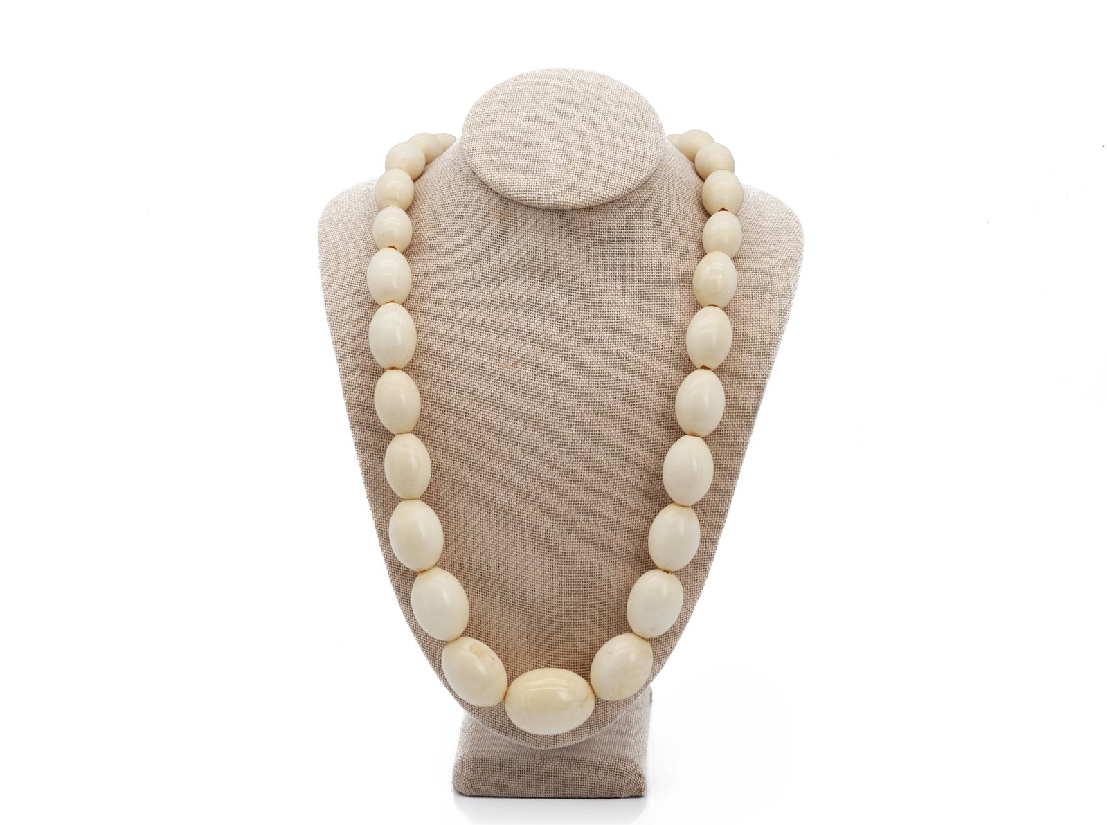 Vintage Fine Polished Cream-Colored Bead Necklace: Title: Vintage Finely Polished Cream-Colored Bead Necklace Medium: Finely Polished Cream-Colored Beads Description: Elegant vintage statement necklace featuring large graduated cream-c