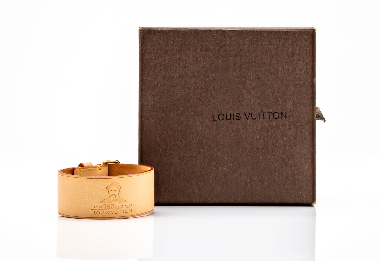 Louis Vuitton "150 Ans 1854-2004" Anniversary Leather Bracelet NYC Ltd. Original Box: Title: Louis Vuitton “150 Ans 1854–2004” Anniversary Leather Bracelet — New York Edition, in Original Box Year: 2004 Limited Edition Material: Natural Vachetta leather with yello