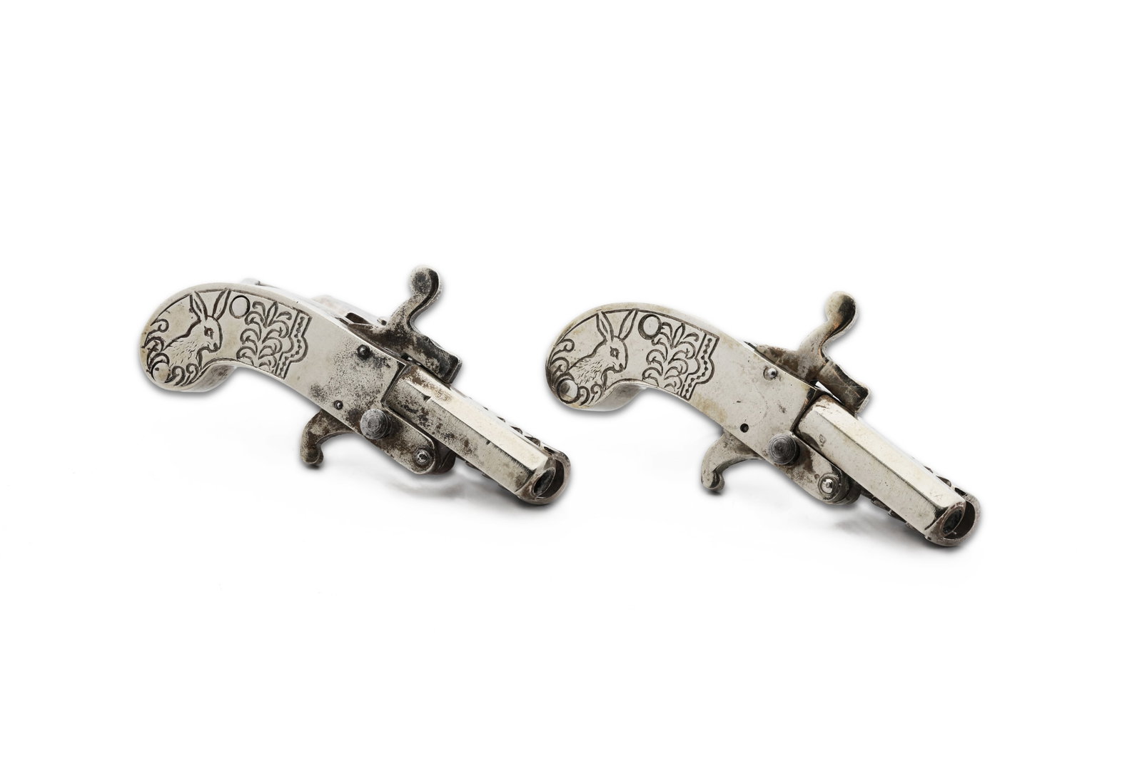 Pair of Vintage Austrian Silver-Tone Pistol Form Tie Clips: Title: Pair of Vintage Austrian Silver-Tone Pistol Form Tie Clips Circa: likely 1950s–1970s Dimensions: each 3.3/4" x 5" Total Weight: Approx. 1.5 in. L x 3/4 in. W
