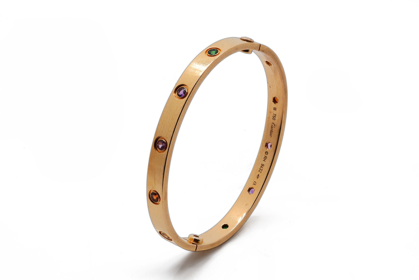 Cartier 18K Yellow Gold Multi-Gemstone LOVE Bracelet, Classic Model: Brand: Cartier Model: LOVE Bracelet, Classic Model Metal: 18K Rose/Yellow Gold (750) Weight: 17.4 g Size Bracelet: 7 in. Gem