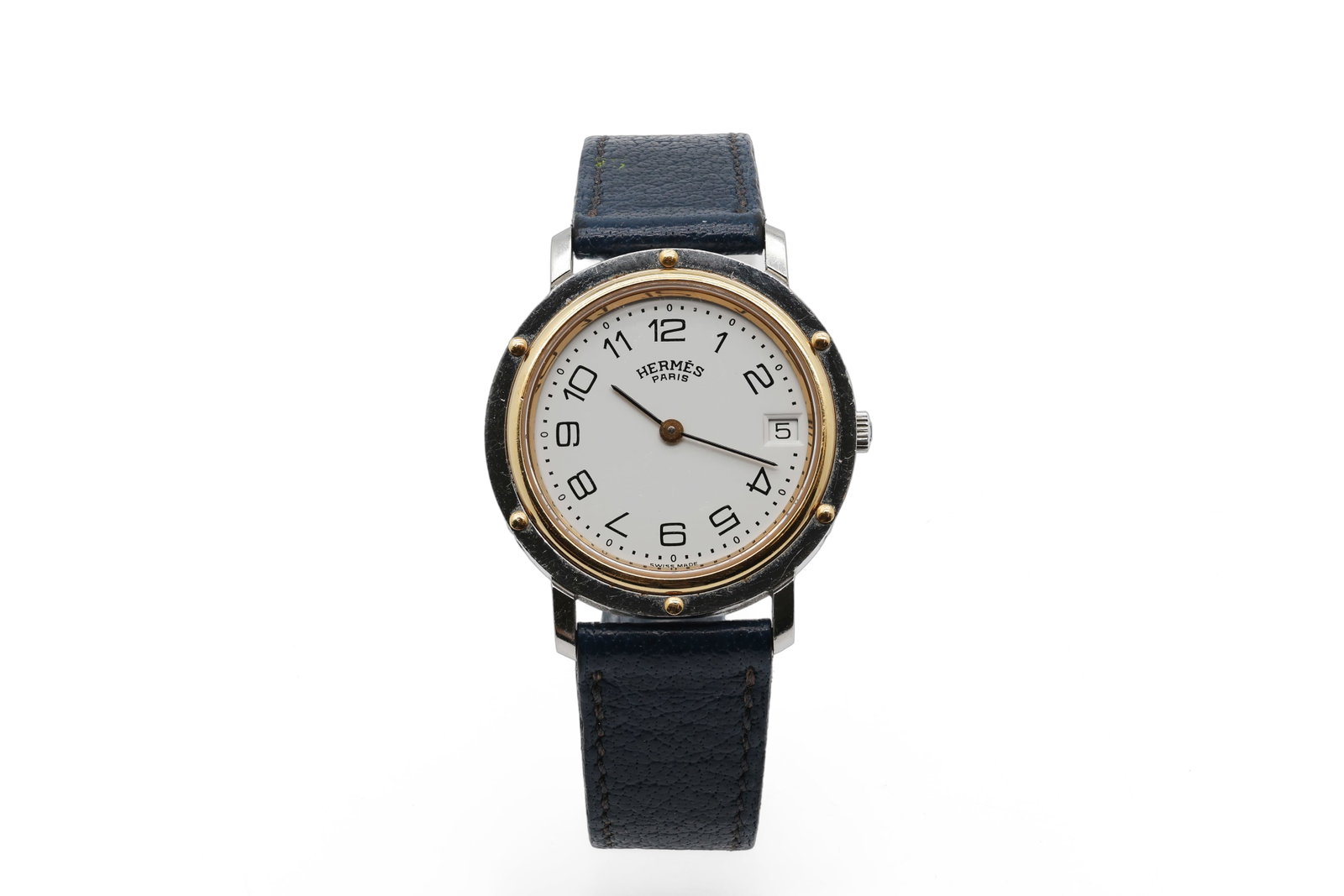 Hermes Heure H HH1.210 Stainless Steel Orange Dial Quartz Watch: Brand: Hermès Model: Heure H Reference: HH1.210 Circa: 2000s Movement: Swiss quartz Case: Stainless steel, s