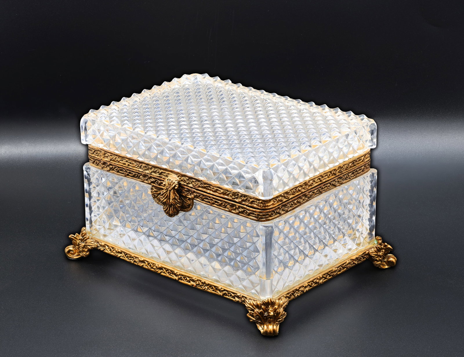 Art Deco Baccarat Style Cut Crystal Jewelry Box with Gilt Bronze Ormolu Mounts: Title: Art Deco Baccarat Style Cut Crystal Jewelry Box with Gilt Bronze Ormolu Mounts Origin: Possibly France Circa: Early 20th Century Dimensions: 6 in. L x 4.5
