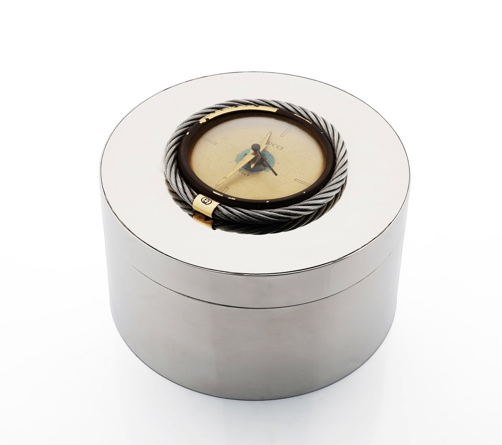 Gucci Desk Clock Gold-tone Dial. Made in Italy: Brand: Gucci Desk Clock Origin: Italy Movement: Quartz Material: Metal case with mirrored finish and cable-style steel frame detail Dial: