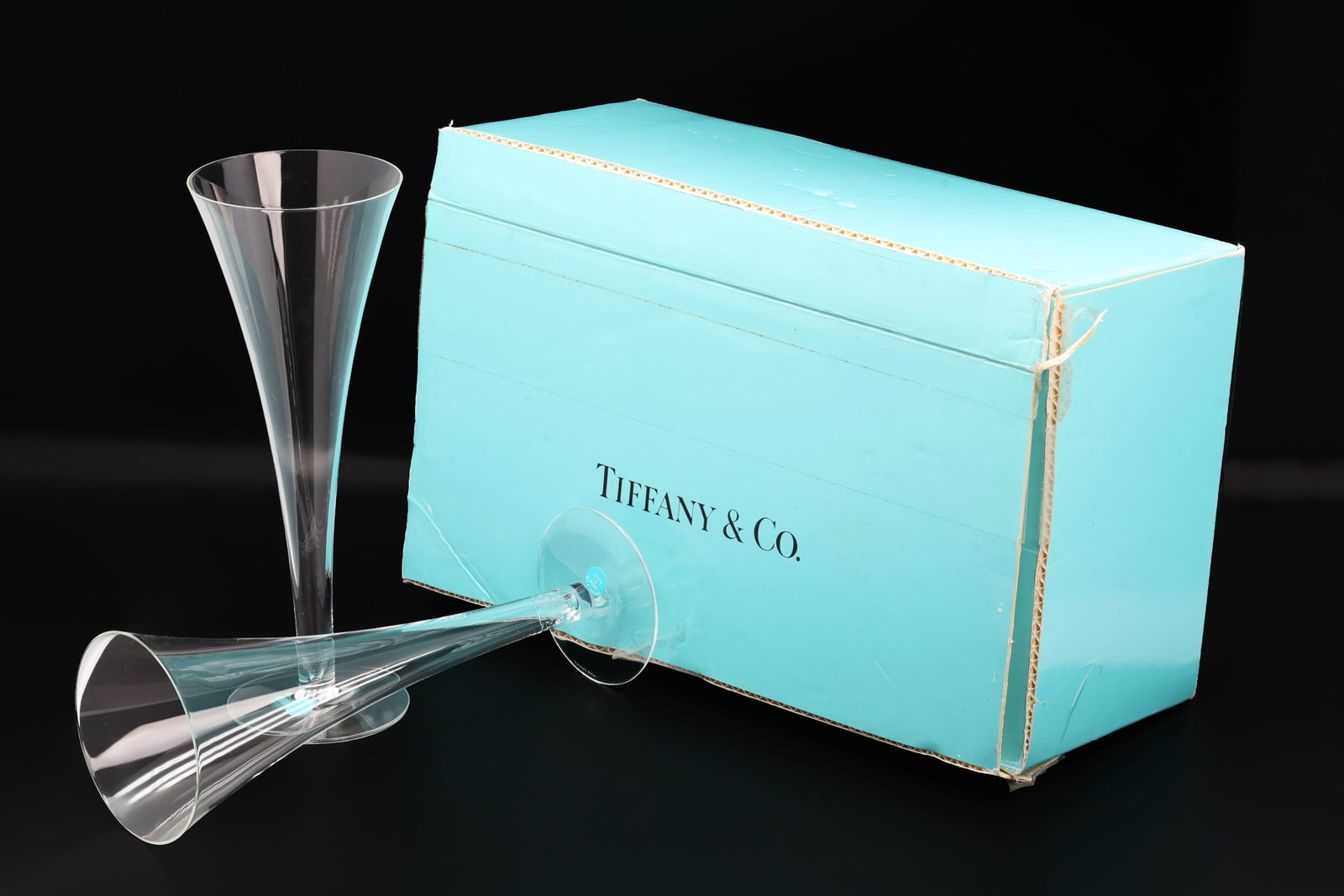 Tiffany & Co. Classic Home Essentials Crystal Champagne Flutes, Pair with Box: Title: Tiffany & Co. Trumpet Crystal Champagne Flute Glasses with Box Origin: United States Year: Late 20th Century Type: Champagne Flute Set Dimen