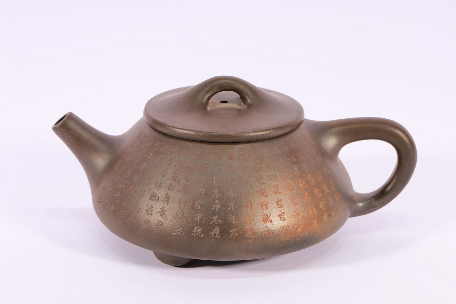 Zisha Clay Heart Sutra Teapot: Zisha Clay Heart Sutra Teapot. Size:13.8cmX9.8cmX6cm