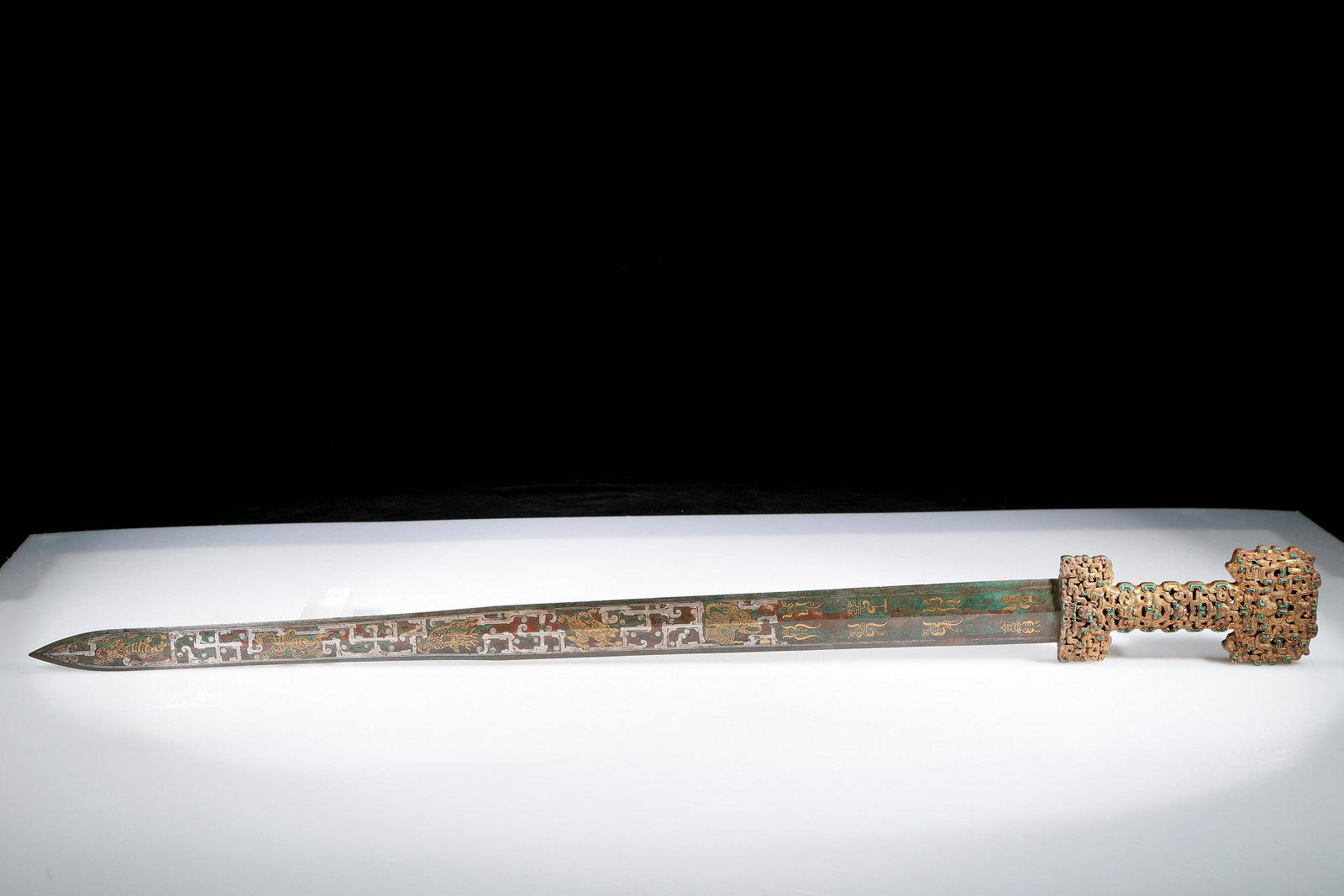 An Archaic Bronze Gold& Silver& Turquoise-Inlaid 'Auspicious Beast' Sword With Inscriptions (1 of 12)