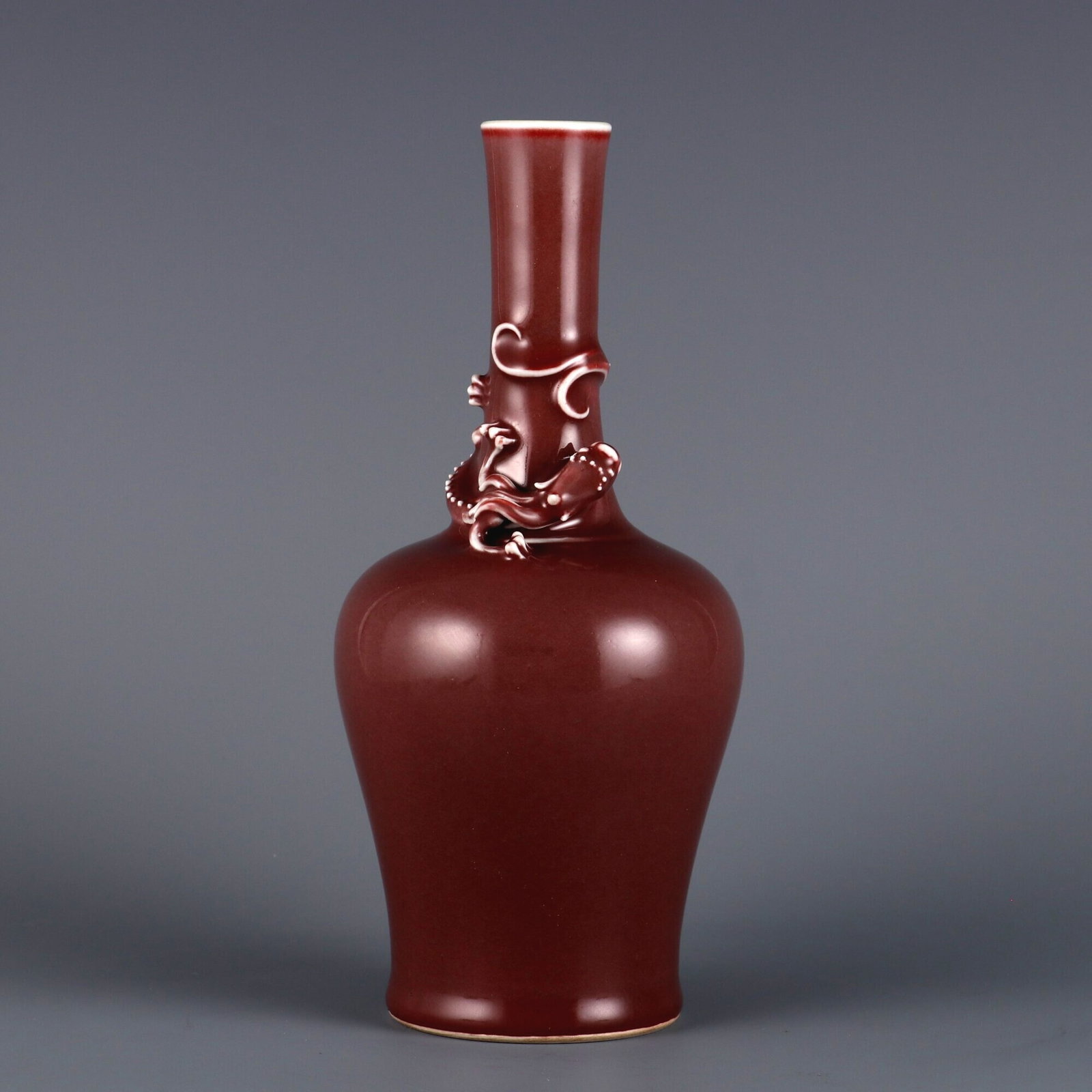 An exquisite cowpea red glaze vase with dragon pattern (1 of 9)