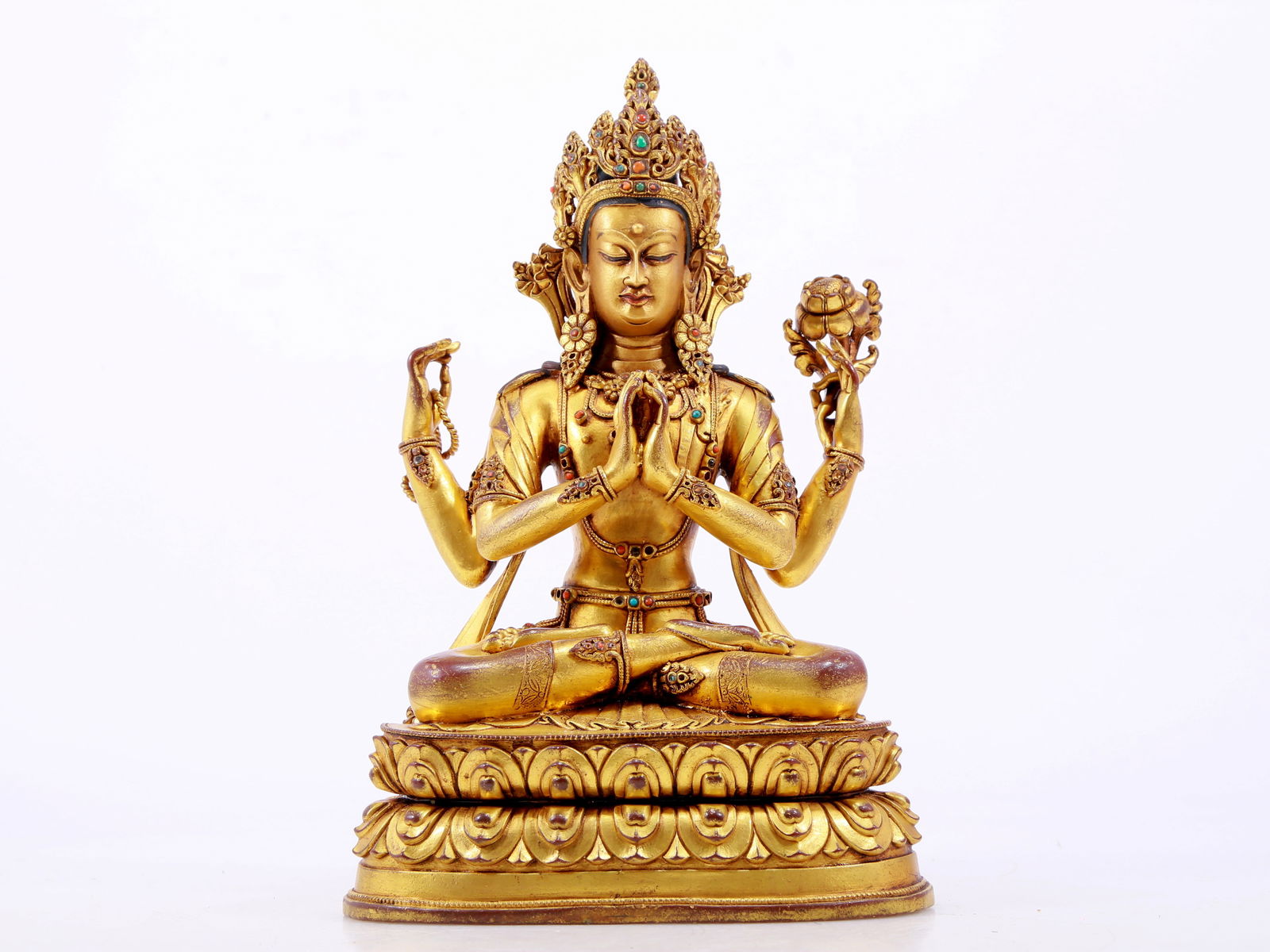 A solemn gilt bronze statue of Guanyin with four arms inlaid with hundreds of treasures (1 of 10)