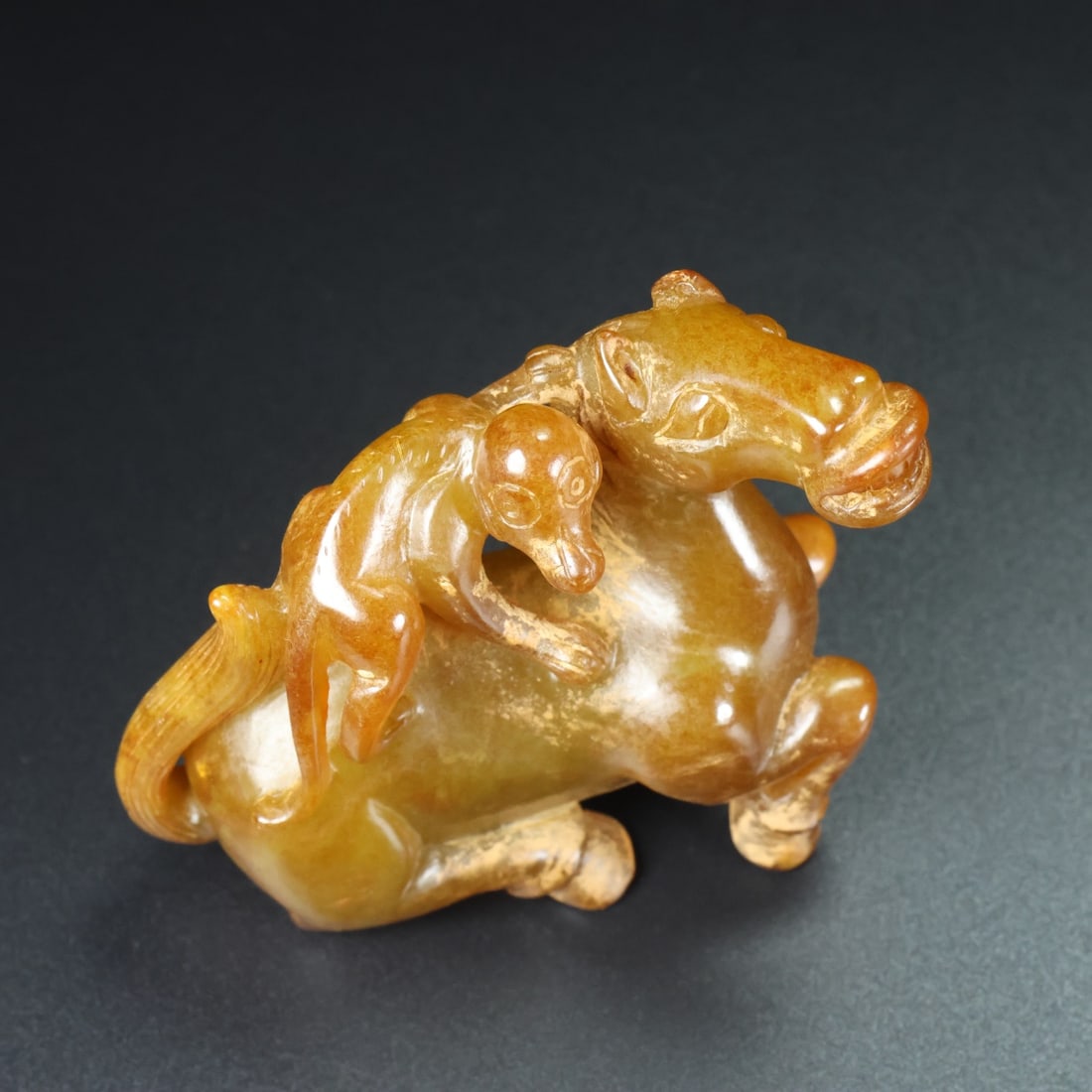 A Rare Yellow Jade Horse Ornament (1 of 9)