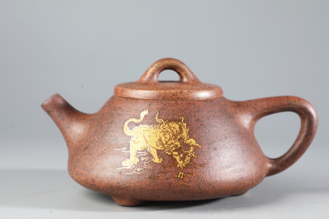 An Exquisite Purple Sands Painted Gold Auspicious Beast Pattern Teapot (1 of 9)