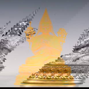 An Excellent Gilt-Bronze Figure Of Tsongkapa: An Excellent Gilt-Bronze Figure Of Tsongkapa. The figure with a dignified expression is rendered clad in long,flowing robes,the voluminous drapery elegantly cascading in folds,topknot surmounted by a