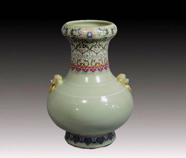A Rare Celadon Glazed Famille-Rose Flower Pattern Lion-Ears Vase: A Rare Celadon Glazed Famille-Rose Flower Pattern Lion-Ears Vase,Qing Dynasty, China,Qianlong Six-character Mark,Size:30cmx21.5cm &#35910;&#38738;&#37321;&#31881;&#24425;&#33457;&#21321;&#32441;&#2942