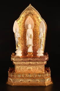 An Exquisite Gilt Bronze Inlaid White Jade Niche: An Exquisite Gilt Bronze Inlaid White Jade Niche Qing Dynasty, China Qianlong Six-character Mark Size:13.8inx8.7inx23.6in