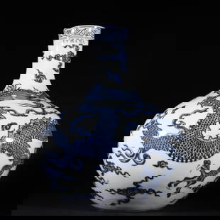 An Exquisite Blue and White Auspicious Cloud Pattern Dragon Pattern Vase: An Exquisite Blue and White Auspicious Cloud Pattern Dragon Pattern Vase Ming Dynasty, China Xuande Six-character Mark Size:16.7inx13.4in&#38738;&#33457;&#31077;&#20113;&#40857;&#32441;&#22825;&#29699