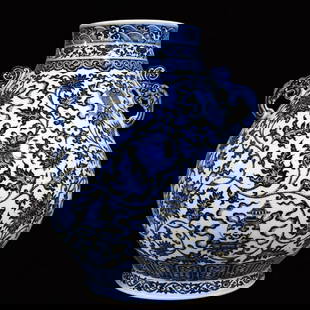 A Huge Blue and White Lotus and Eight Treasures Pattern Double-Ears Vase: A Huge Blue and White Lotus and Eight Treasures Pattern Double-Ears Vase,Qing Dynasty, China,Qianlong Six-character Mark,Size:18.1inx14.6in &#38738;&#33457;&#32544;&#26525;&#33714;&#20843;&#23453;&#32