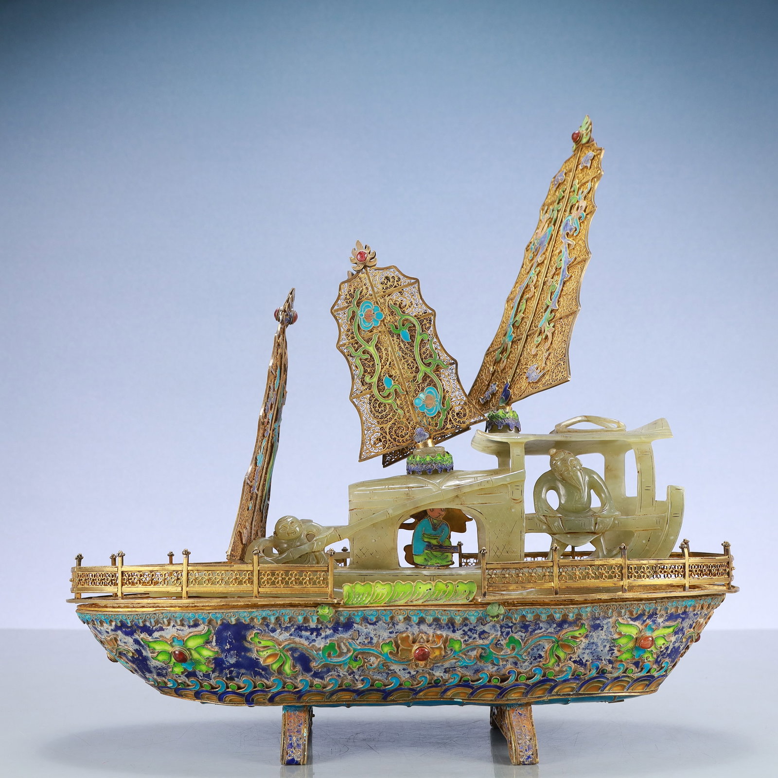 A Exquisite Gilt Bronze Inlaid Gems Lotus Pattern Boat Ornament: A Exquisite Gilt Bronze Inlaid Gems Lotus Pattern Boat Ornament Qing Dynasty, China Size:13inx5.5inx13.8in Weight:2000g铜鎏金嵌百宝缠枝莲纹&