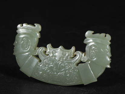 An Exquisite White Jade Beast-Face Pattern Ornament: An Exquisite White Jade Beast-Face Pattern Ornament Qing Dynasty, China Size:2.7inx1.5inx0.2in Weight:26g白玉双首神人佩 中国清代