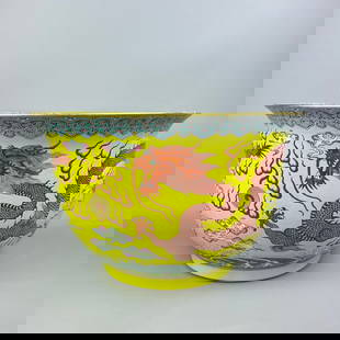 A Rare  Famille Rose Yellow Ground with Iron Red Auspicious Cloud and Dragon Pattern Flowerpot: A Rare Famille Rose Yellow Ground with Iron Red Auspicious Cloud and Dragon Pattern Flowerpot,Qing Dynasty, China,Qianlong Four-character Mark,Size:9.6inx15.9in &#31881;&#24425;&#40644;&#22320;&#30718