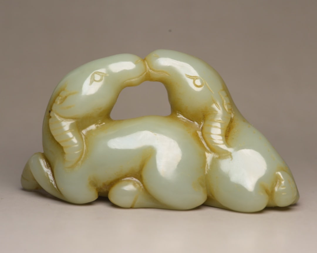 An Exquisite White Jade Sheep Hand Piece (1 of 8)