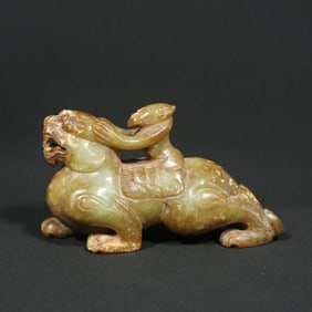 An Exquisite White Jade Auspicious Beast Ornament