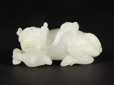 An Exquisite White Jade Auspicious Beast Ornament