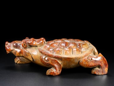 An Exquisite White Jade Auspicious Beast Ornament