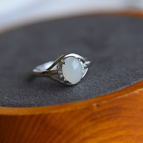 An Exquisite Silver Inlaid White Jade Ring
