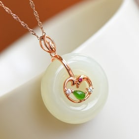 An Exquisite Silver Inlaid White Jade Pendant