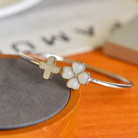 An Exquisite Silver Inlaid White Jade Bracelets