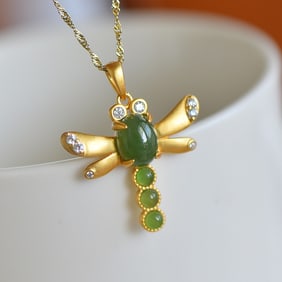 An Exquisite Gilt Silver Inlaid Jasper Pendant