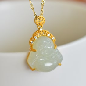 An Exquisite Gilt Silver Inlaid White Jade Statue of Maitreya Buddha Pendant