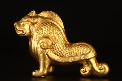 A Rare Gilt Bronze Sea Beast Ornament