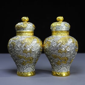 A pair of Rare Silver Gilt Carved Dragon Pattern Jars